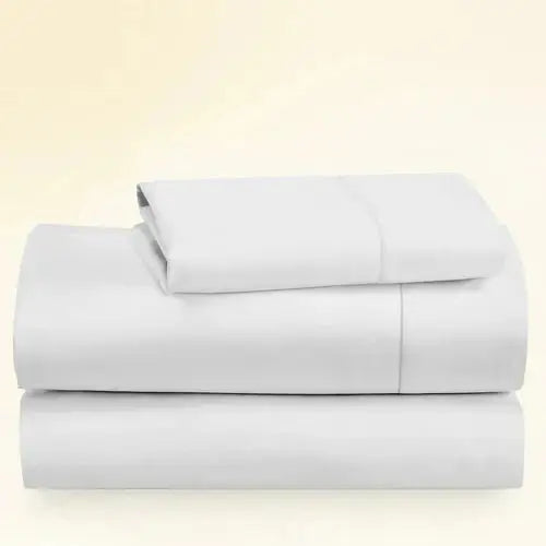 "CinchFit King Sheet Sets in white, 400TC cotton with 15-inch depth for snug mattress fit. Premium USA-made bedding for lasting comfort."