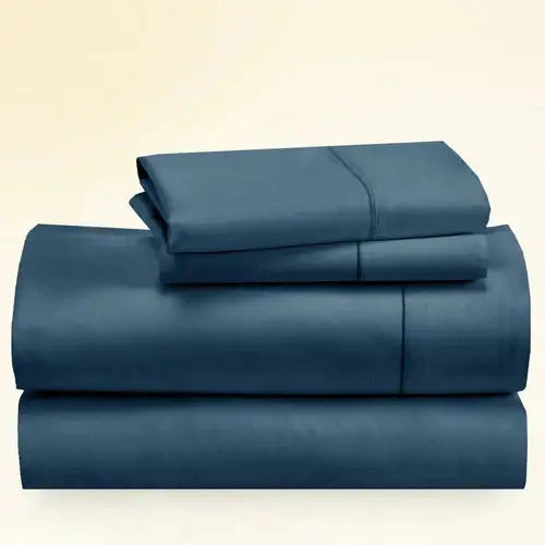 "CinchFit King Sheet Set in navy blue, 400TC cotton with 15-inch depth. Elegant and durable USA-made bedding for deep mattresses."