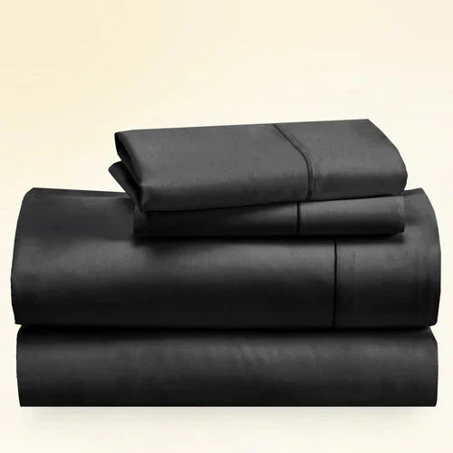"CinchFit King Sheet Set in black, 400TC cotton with 15-inch deep pockets. Luxurious and secure bedding made in the USA."