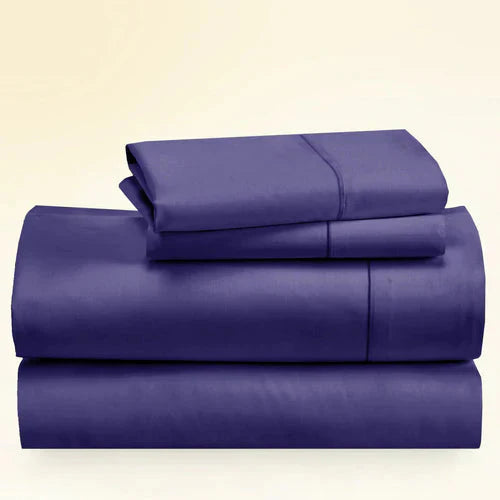 "CinchFit King Sheet Set in purple, 400TC cotton with 15-inch depth. Vibrant USA-made bedding with secure elastic fit."