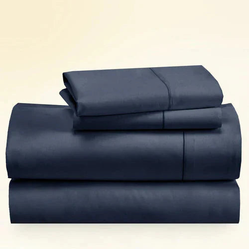 "CinchFit King Sheet Set in navy, 400TC cotton with 15-inch depth. Durable and soft bedding handcrafted in the USA."