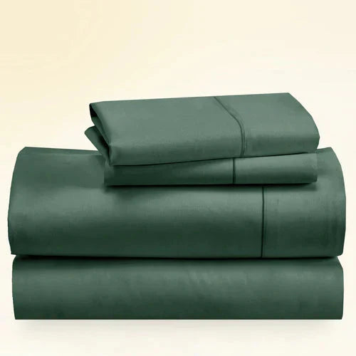 "CinchFit King Sheet Set in forest green, 400TC cotton. 15-inch deep pockets and secure fit for king mattresses."