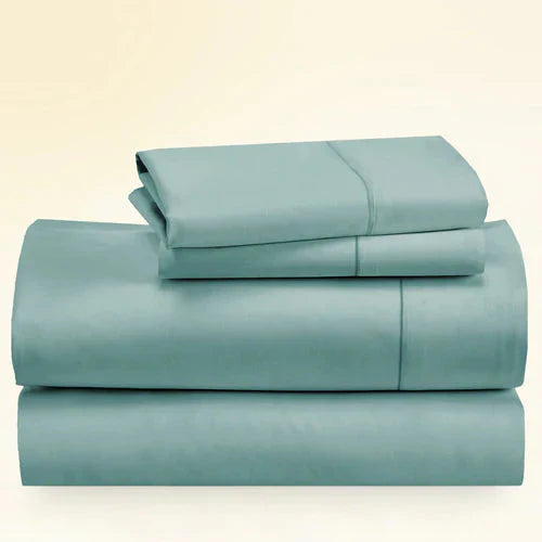 "CinchFit King Sheet Set in teal, 400TC cotton with 15-inch depth. USA-made bedding with secure fit for king mattresses."